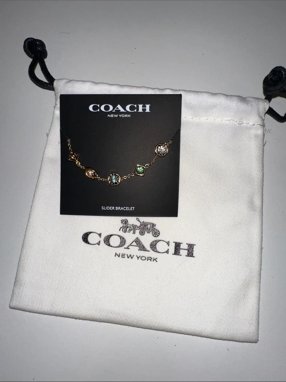 Coach Gold Slider Bracelet with Multicolor Stones